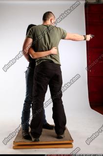 AIDEEN-STANDING-AIMING-GUNS