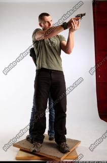 AIDEEN-STANDING-AIMING-GUNS2