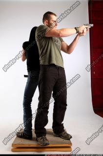 AIDEEN-STANDING-AIMING-GUNS2