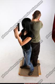 AIDEEN-STANDING-AIMING-GUNS2