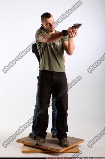 2010 02 AIDEEN STANDING AIMING GUNS2 07 B