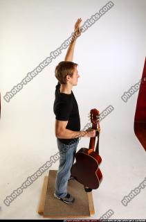 marco-guitar-singer-waving