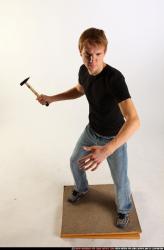 Man Young Athletic White Fighting with hammer Standing poses Sportswear