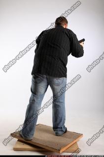 2010 03 DANIEL STANDING DUAL PISTOLS POSE1 05 C