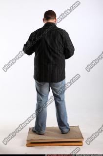 daniel-standing-pouring-whisky