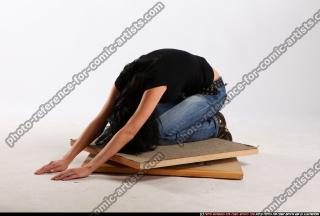 silvia-kneeling-head-down