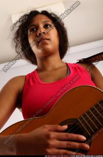 ELLIE-PLAYING-GUITAR