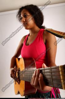 ELLIE-PLAYING-GUITAR