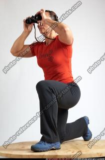 2010 06 ANGELINA KNEELING WATCHING BINOCULARS 01 C.JPG