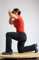 Woman Adult Muscular White Neutral Kneeling poses Sportswear