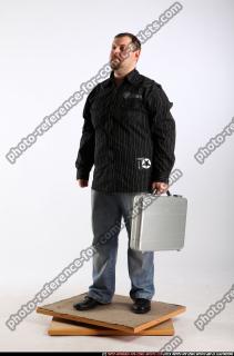 daniel-standing-suitcase