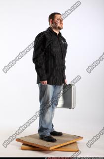 daniel-standing-suitcase