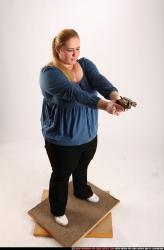 Woman Adult Chubby White Fighting with gun Standing poses Casual