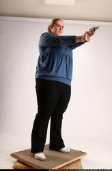 Woman Adult Chubby White Fighting with gun Standing poses Casual