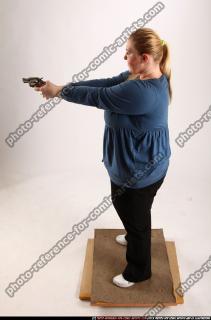 2010 07 BRITNEY STANDING AIMING PISTOL 02 A
