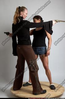 2010 07 WOMEN AIMING GUNS 03.jpg