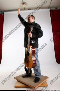 daniel-guitar-singer-waving