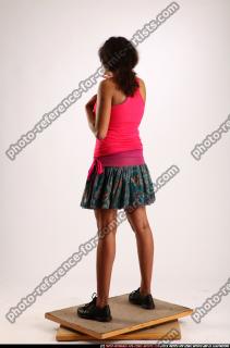 ELLIE-STANDING-EXPLAINING