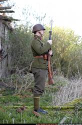 Man Adult Average White Fighting with rifle Standing poses Army