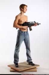 Man Young Athletic White Fighting with submachine gun Standing poses Pants