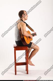 frankie-sitting-playing-guitar