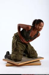 Woman Young Athletic Black Neutral Kneeling poses Army