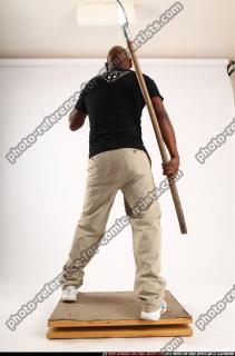 Gael Casaus-standing-stick-idle
