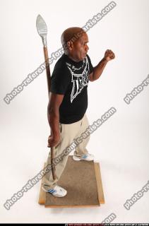 Gael Casaus-standing-stick-idle