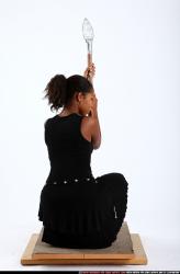 Woman Adult Athletic Black Martial art Kneeling poses Casual