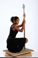 Woman Adult Athletic Black Martial art Kneeling poses Casual