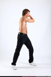 Man Young Athletic White Fighting with knife Standing poses Pants