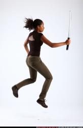 Woman Young Athletic Black Fighting with sword Moving poses Casual