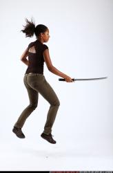 Woman Young Athletic Black Fighting with sword Moving poses Casual