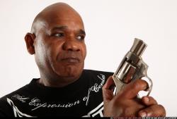 Man Old Average Black Fighting with gun Detailed photos Sportswear