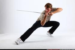 Man Young Athletic White Fighting with sword Kneeling poses Sportswear