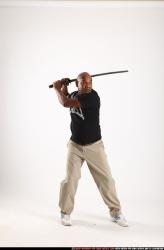 Man Old Average Black Fighting with sword Standing poses Casual