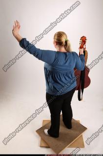 2010 10 BRITNEY GUITAR SINGER WAVING 03 A