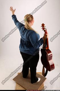 2010 10 BRITNEY GUITAR SINGER WAVING 05 A