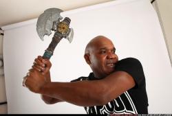 Man Old Average Black Fighting with sword Standing poses Casual