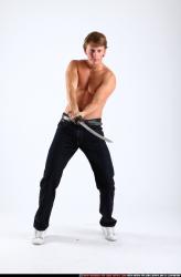 Man Young Athletic White Fighting with sword Standing poses Pants