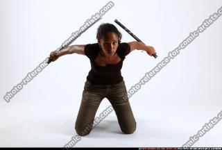 jenna-kneeling-dual-katana