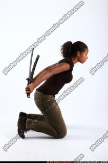 jenna-kneeling-dual-katana