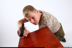 Man Adult Average White Fighting with gun Kneeling poses Army