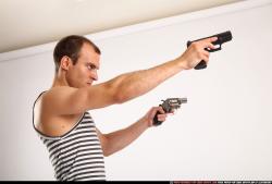Man Young Athletic White Fighting with gun Standing poses Casual