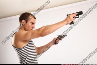 2010 10 FRANKIE SHOOTING DUAL PISTOLS2 05