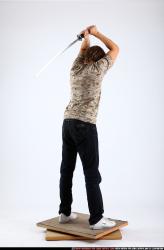 Man Young Athletic White Fighting with sword Standing poses Casual