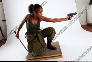 jenna-kneeling-katana-pistol
