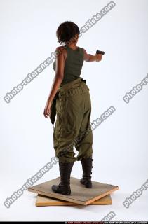 jenna-standing-shooting-pistol