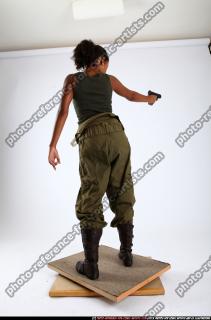 jenna-standing-shooting-pistol