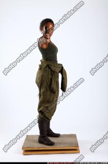 jenna-standing-shooting-pistol